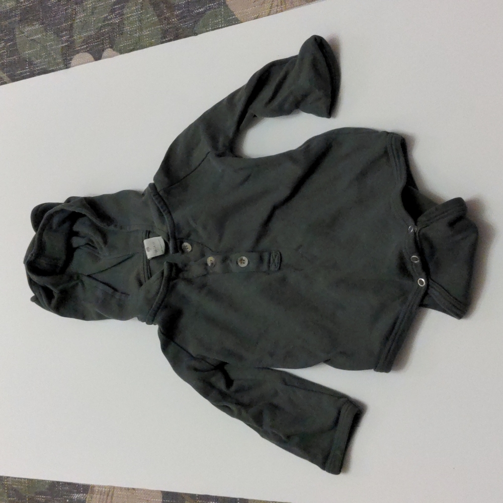 Kate Quinn  green bear onesie